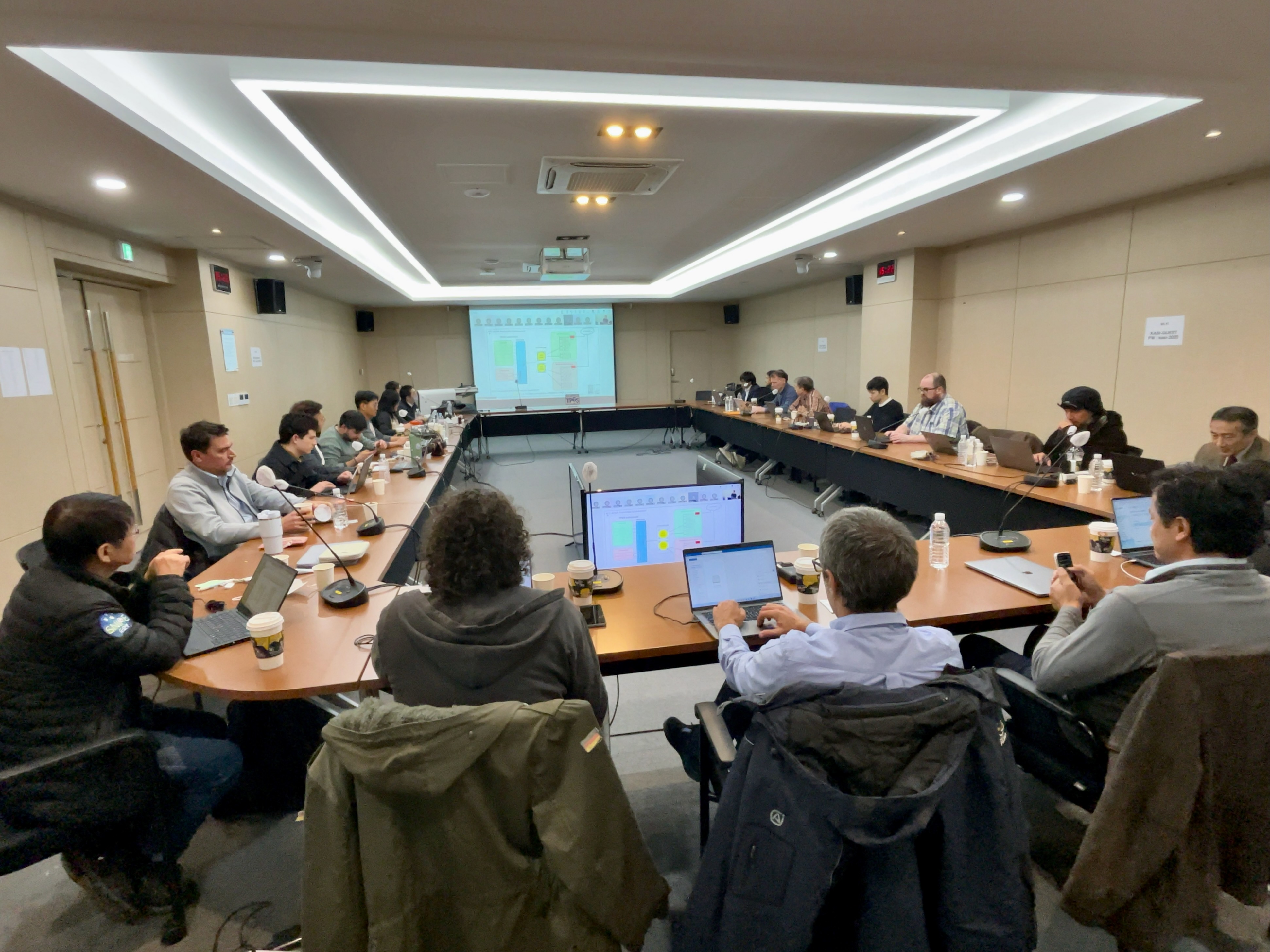 TPGS development team discussion during the design review meeting